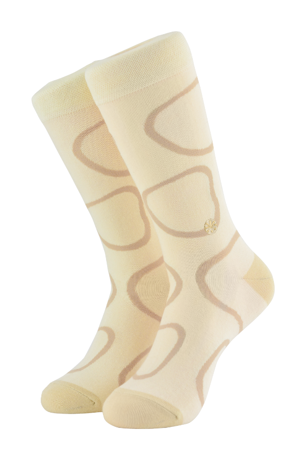 Cream socks. The Twiga socks is an alternative design of the giraffe pattern. The Swahili word for giraffe is twiga. Giraffe's are a common sight across Africa savannah's, from East to Southern Africa.