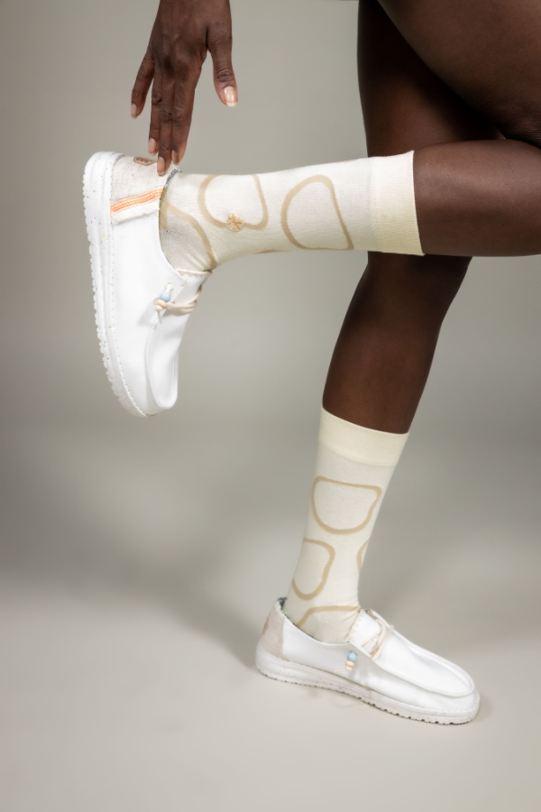 Cream socks. The Twiga socks is an alternative design of the giraffe pattern. The Swahili word for giraffe is twiga. Giraffe's are a common sight across Africa savannah's, from East to Southern Africa.