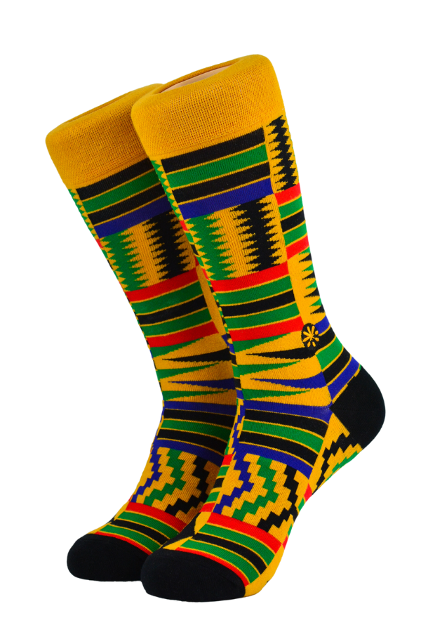 This design draws inspiration from the prominent African textile known as the Kente Cloth. It originates from the native land of the Akans, an ethnic group located in Southern Ghana. Akans refer to the cloth as nwentoma, which translates to "woven cloth." At the time of inception, it was the royal and sacred cloth worn during times of importance and was seen as the "cloth of kings. "