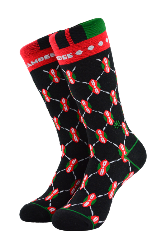 Black, green, and red socks with a Maasai shield, inspired by Kenya