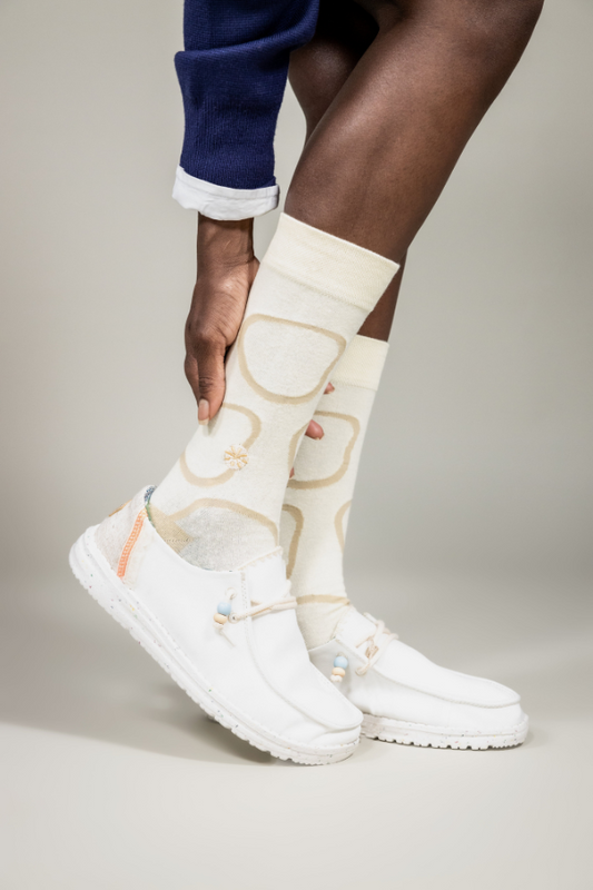 Cream socks. The Twiga socks is an alternative design of the giraffe pattern. The Swahili word for giraffe is twiga. Giraffe's are a common sight across Africa savannah's, from East to Southern Africa. 
